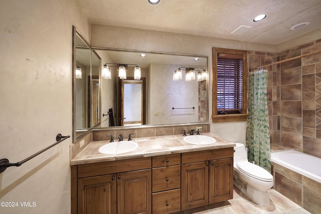 full bathroom featuring shower / bathtub combination with curtain, vanity, and toilet