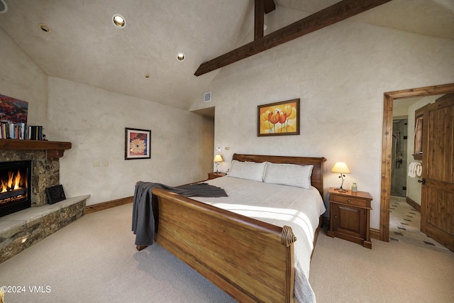 bedroom with a fireplace, beam ceiling, high vaulted ceiling, and light carpet