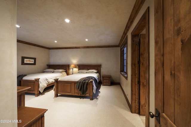 carpeted bedroom with crown molding