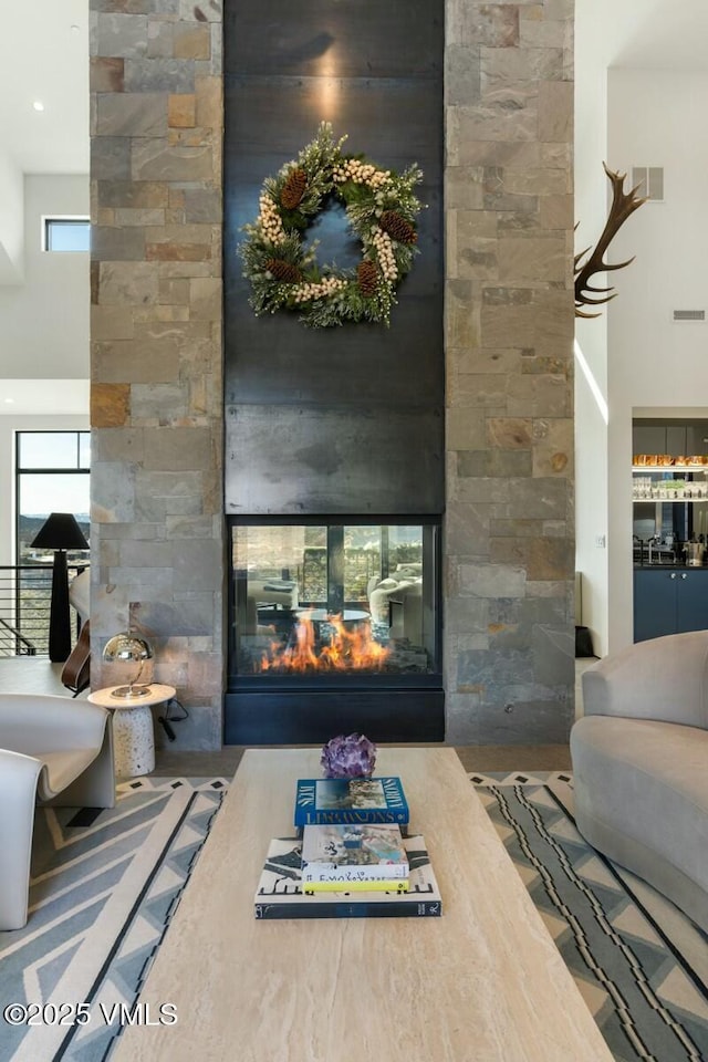 1658 E Haystacker Dr, Eagle, CO 81631 - living room with a multi sided fireplace and a high ceiling