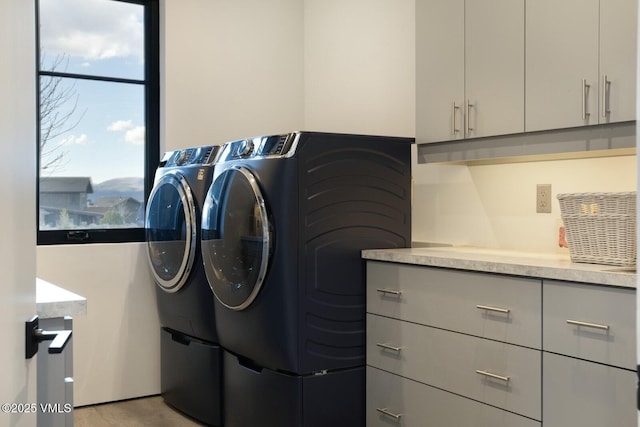 1658 E Haystacker Dr, Eagle, CO 81631 - clothes washing area with washer and dryer and cabinet space