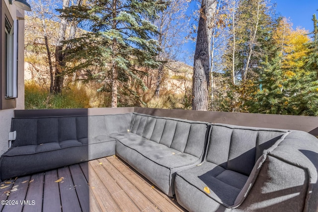 deck with an outdoor hangout area