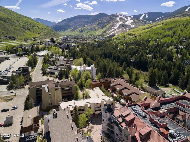 531 E Lionshead Cir Unit 303, Vail, CO 81657 - aerial overview of property's location with mountains and a heavily wooded area