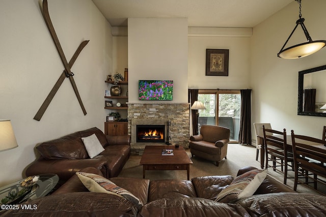 531 E Lionshead Cir Unit 303, Vail, CO 81657 - carpeted living area with a fireplace
