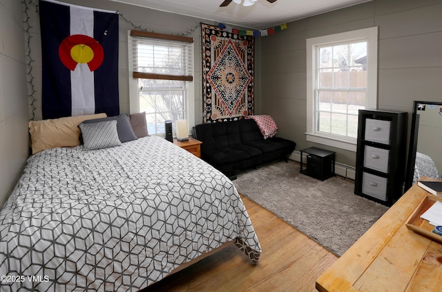 546 Grand Ave, Eagle, CO 81631 - carpeted bedroom with baseboards, ceiling fan, a baseboard heating unit, and vaulted ceiling