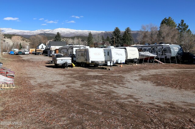 546 Grand Ave, Eagle, CO 81631 - view of parking featuring a mountain view
