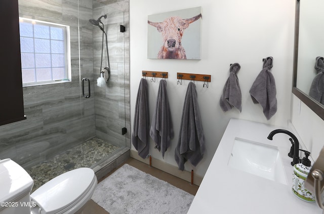 546 Grand Ave, Eagle, CO 81631 - bathroom with a shower stall, vanity, and toilet