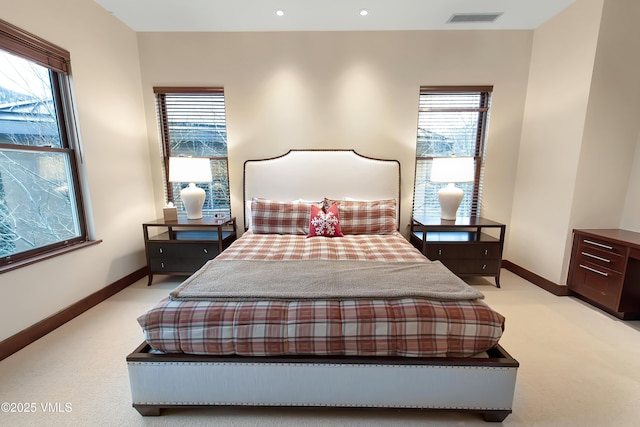1325 Westhaven Dr Unit A302, Vail, CO 81657 - bedroom featuring light carpet, multiple windows, and recessed lighting