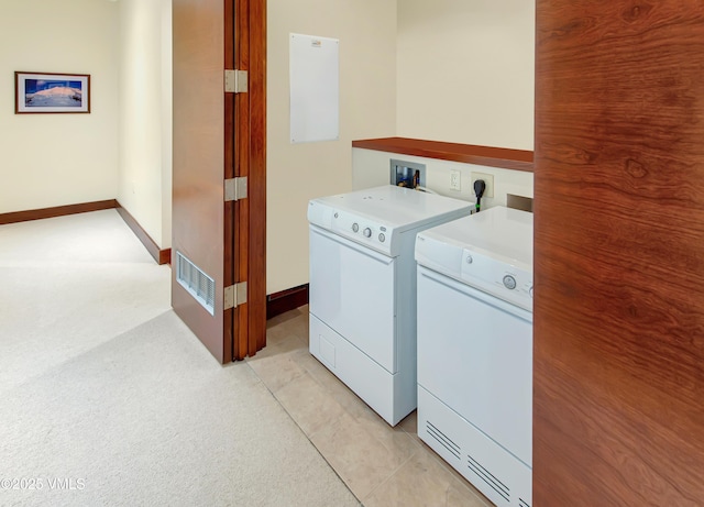 1325 Westhaven Dr Unit A302, Vail, CO 81657 - laundry area featuring independent washer and dryer and light colored carpet