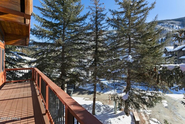 view of snow covered deck