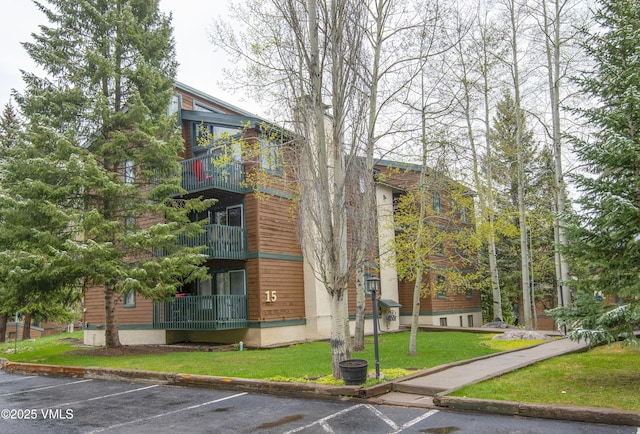 4480 Timber Falls Ct Unit 1507, Vail, CO 81657 - view of building exterior featuring uncovered parking