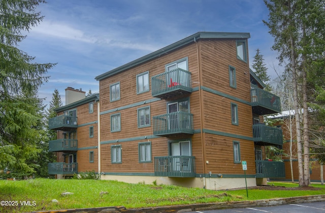 4480 Timber Falls Ct Unit 1507, Vail, CO 81657 - view of property featuring uncovered parking