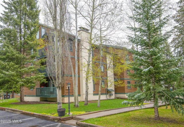 4480 Timber Falls Ct Unit 1507, Vail, CO 81657 - view of home's community with uncovered parking and a lawn