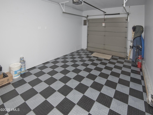 1230 Lions Ridge Loop Unit 2-D, Vail, CO 81657 - garage featuring a garage door opener