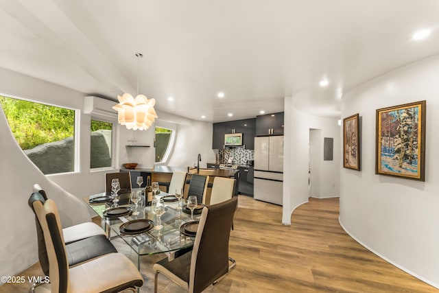 2940 Basingdale Blvd Unit 2, Vail, CO 81657 - dining room featuring light wood-type flooring and recessed lighting