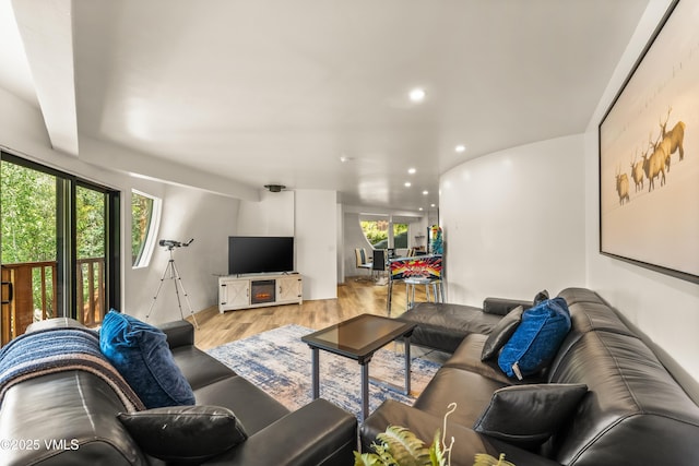 2940 Basingdale Blvd Unit 2, Vail, CO 81657 - living area featuring wood finished floors, plenty of natural light, and recessed lighting