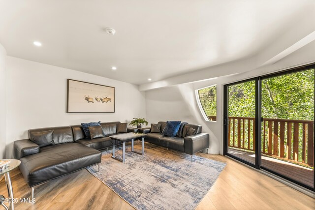 2940 Basingdale Blvd Unit 2, Vail, CO 81657 - living room with healthy amount of natural light, light wood finished floors, and recessed lighting