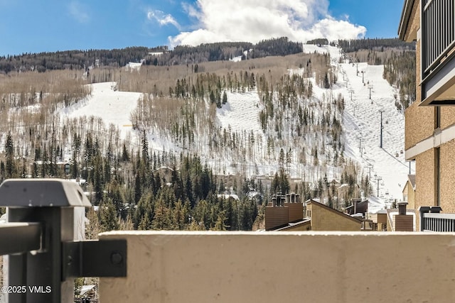 property view of mountains with a forest view