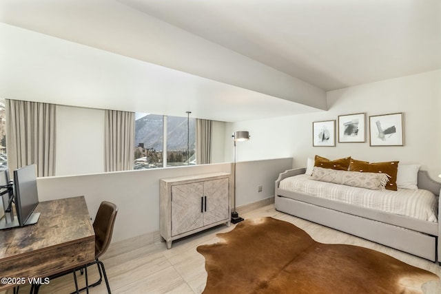 bedroom featuring baseboards