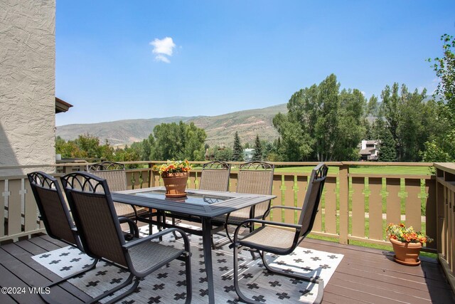 deck with a mountain view