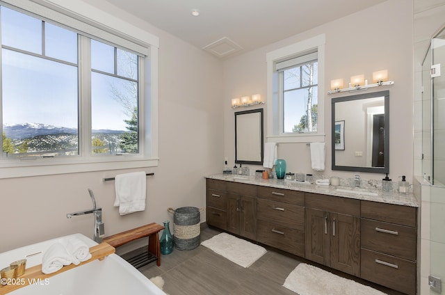 2682 E Haystacker Dr, Eagle, CO 81631 - bathroom with a freestanding bath and double vanity