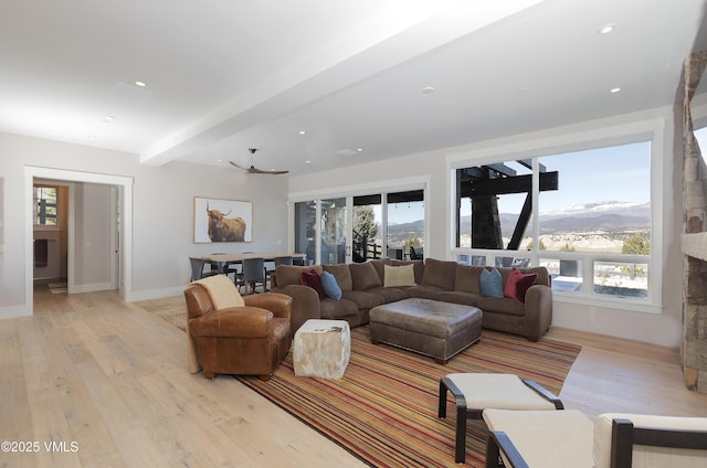 2682 E Haystacker Dr, Eagle, CO 81631 - living room featuring light wood-style floors, healthy amount of natural light, recessed lighting, and a mountain view