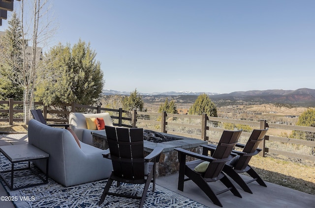 2682 E Haystacker Dr, Eagle, CO 81631 - view of patio / terrace with a fire pit and a mountain view
