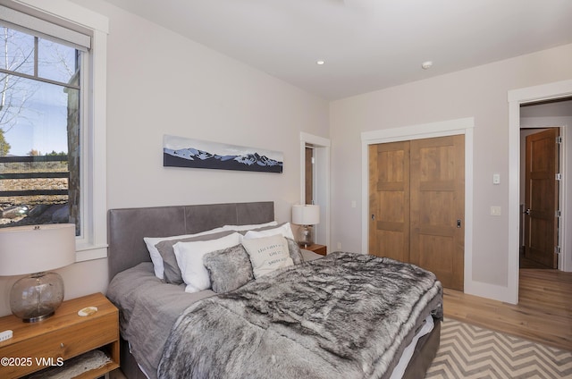 2682 E Haystacker Dr, Eagle, CO 81631 - bedroom featuring light wood-style flooring, recessed lighting, and a closet