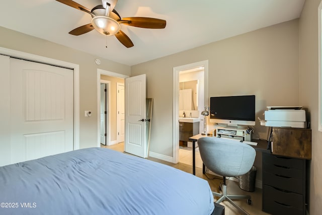 11 Spruce Cir, Edwards, CO 81632 - bedroom featuring ensuite bathroom, a desk, light wood-style flooring, a ceiling fan, and a closet