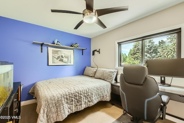 11 Spruce Cir, Edwards, CO 81632 - bedroom featuring wood finished floors, ceiling fan, and a desk