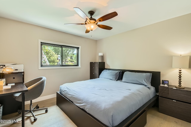 11 Spruce Cir, Edwards, CO 81632 - bedroom featuring light wood finished floors, an office area, and a ceiling fan