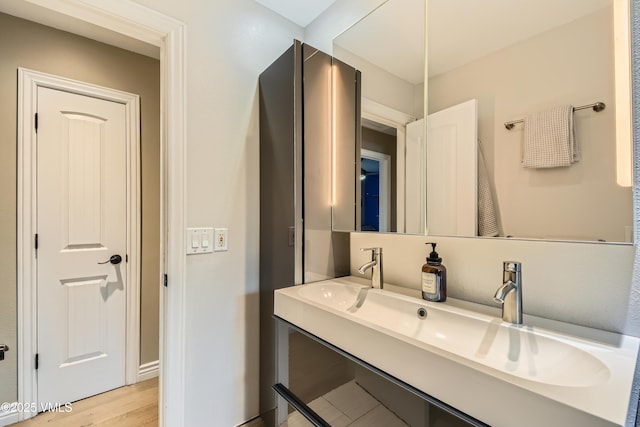 11 Spruce Cir, Edwards, CO 81632 - bathroom with vanity and wood finished floors