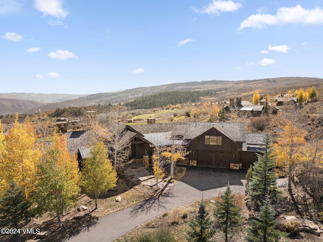 birds eye view of property featuring a mountain view