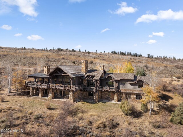 rear view of property featuring a rural view