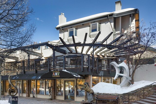 view of snow covered building