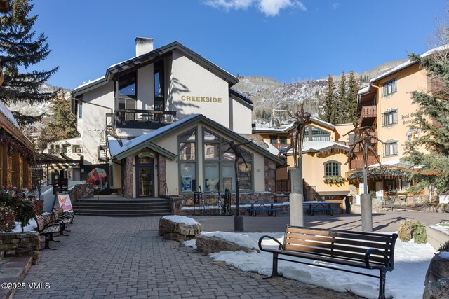 view of home's community featuring a mountain view