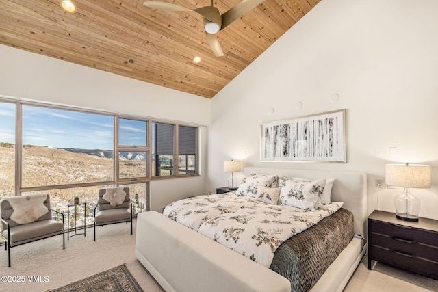 bedroom featuring wood ceiling, light colored carpet, and high vaulted ceiling