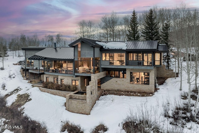 view of snow covered property