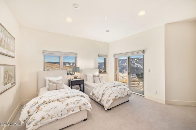 bedroom featuring access to outside and carpet flooring