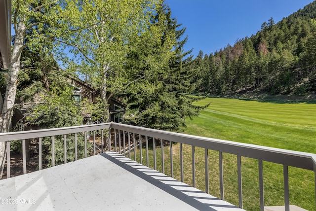 130 Grouse Ct Unit B, Avon, CO 81620 - wooden terrace featuring a lawn