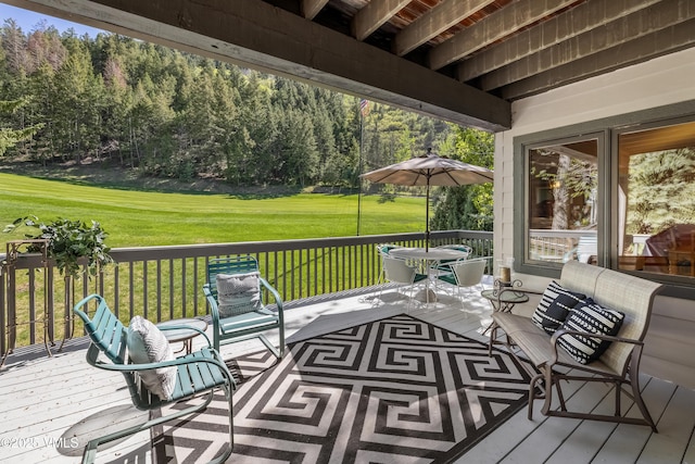 130 Grouse Ct Unit B, Avon, CO 81620 - wooden terrace featuring a lawn