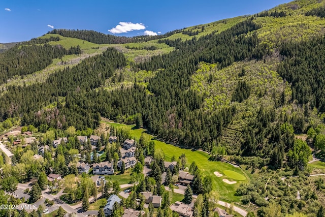130 Grouse Ct Unit B, Avon, CO 81620 - aerial view of property and surrounding area with a forest and mountains