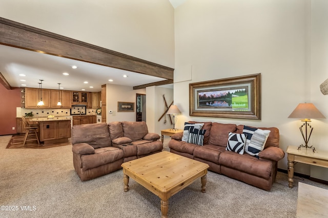 130 Grouse Ct Unit B, Avon, CO 81620 - living area with recessed lighting, light carpet, and beam ceiling