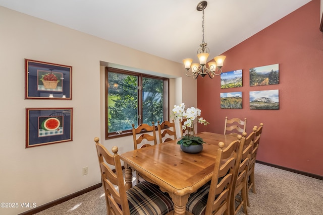 130 Grouse Ct Unit B, Avon, CO 81620 - carpeted dining area featuring a chandelier, baseboards, and vaulted ceiling
