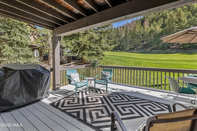 130 Grouse Ct Unit B, Avon, CO 81620 - wooden terrace with a grill and a yard
