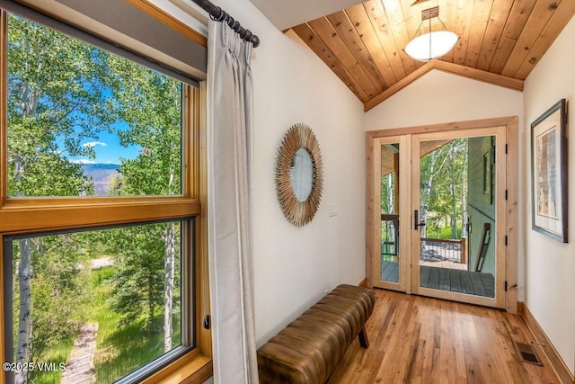 225 Eagle Crest Rd, Edwards, CO 81632 - doorway to outside featuring wood finished floors, vaulted ceiling, plenty of natural light, and wood ceiling