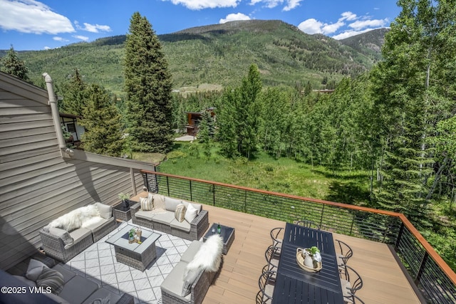 5074 Main Gore Dr S Unit B, Vail, CO 81657 - deck with an outdoor living space, a mountain view, and a wooded view