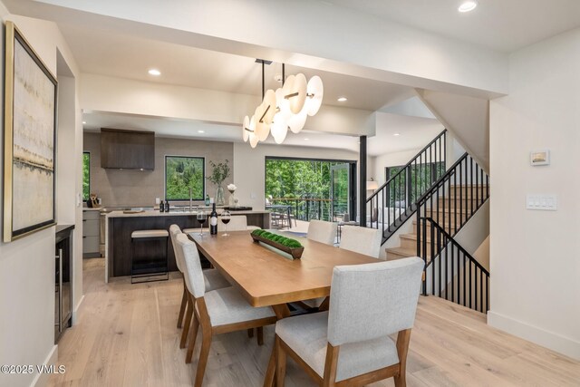 5074 Main Gore Dr S Unit B, Vail, CO 81657 - dining room with light wood-style flooring, recessed lighting, a chandelier, and stairway