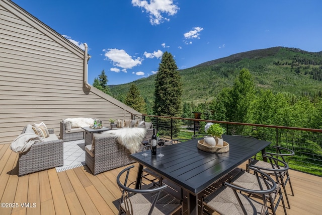 5074 Main Gore Dr S Unit B, Vail, CO 81657 - wooden deck with a mountain view, outdoor lounge area, and a wooded view