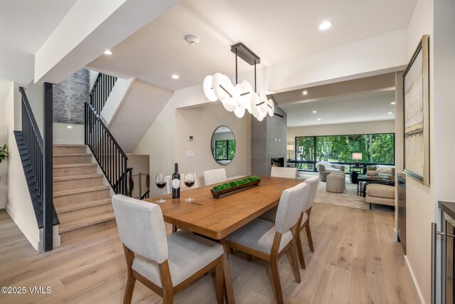 5074 Main Gore Dr S Unit B, Vail, CO 81657 - dining space with light wood finished floors, stairway, and recessed lighting